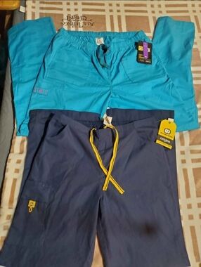 Wonder Wink Two-Pair Scrub Pants in Teal and Navy with Yellow Drawcord